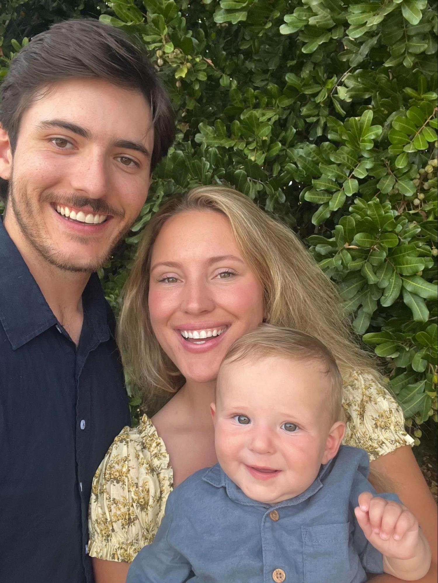 Family photo of Dominic Fanucchi with his wife and baby