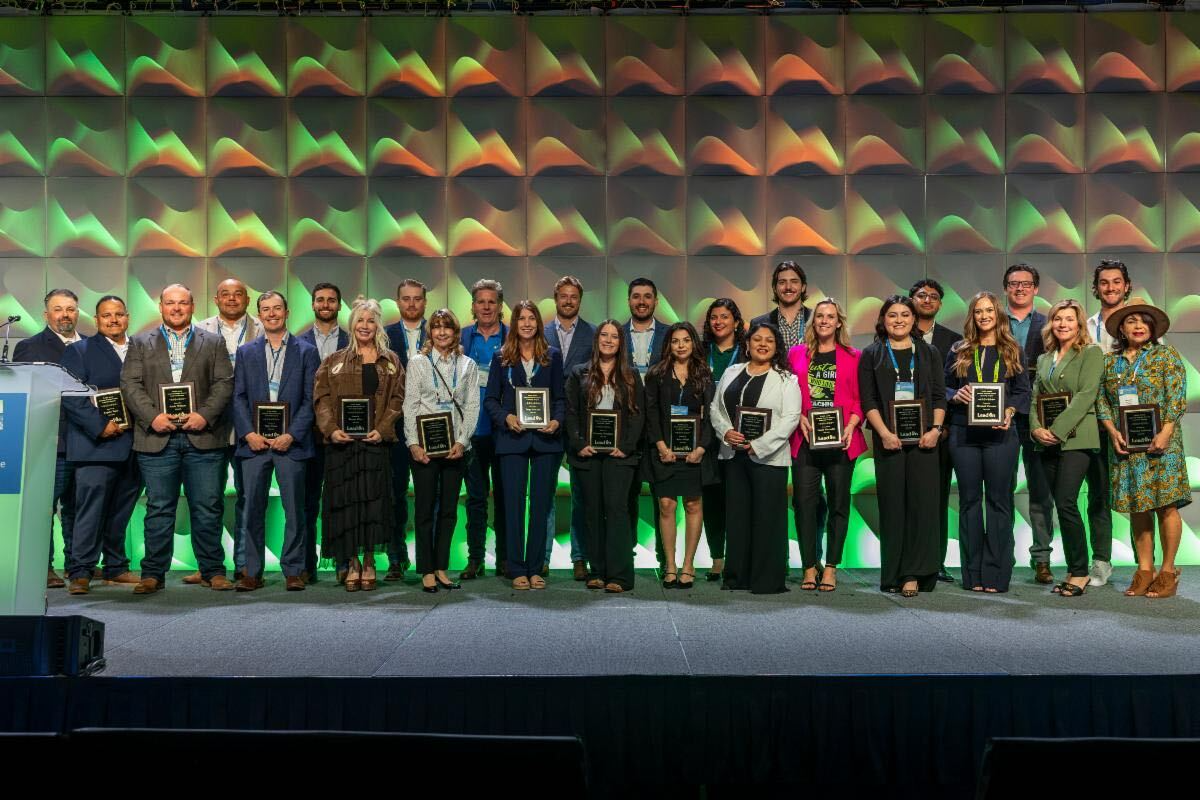 Group photo of the 2024-2025 APG LeadOn class on stage